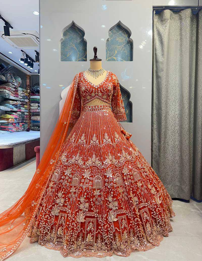 orrange colour Heavy Embroidered Lehenga Set with Golden Zari and Sequin Work