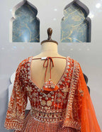 orrange colour Heavy Embroidered Lehenga Set with Golden Zari and Sequin Work