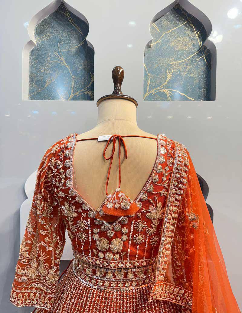 orrange colour Heavy Embroidered Lehenga Set with Golden Zari and Sequin Work
