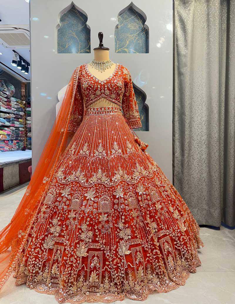 orrange colour Heavy Embroidered Lehenga Set with Golden Zari and Sequin Work
