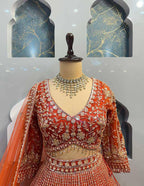 orrange colour Heavy Embroidered Lehenga Set with Golden Zari and Sequin Work