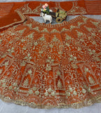 orrange colour Heavy Embroidered Lehenga Set with Golden Zari and Sequin Work