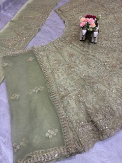 pista colour Heavy Embroidered Lehenga Set with Golden Zari and Sequin Work