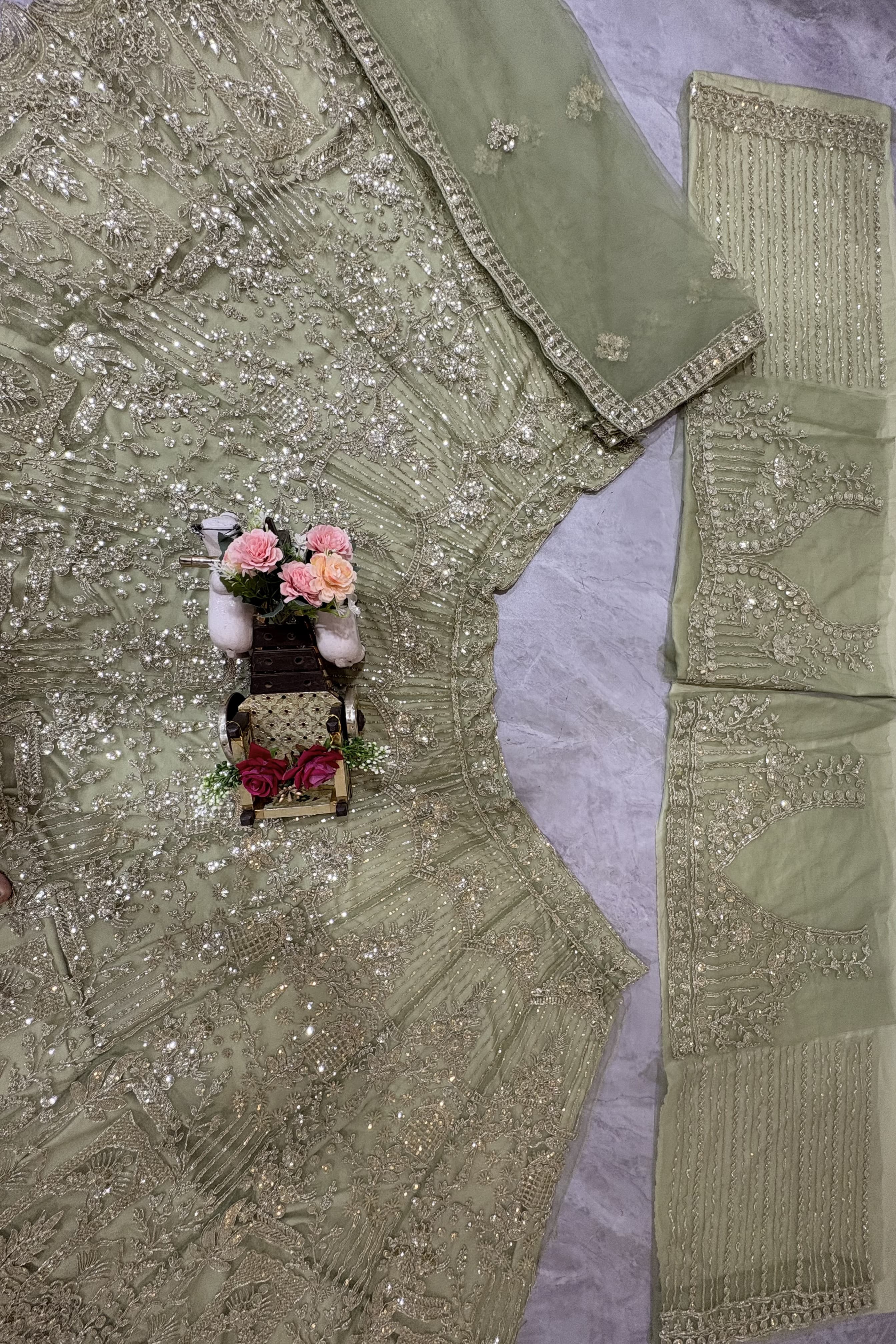 pista colour Heavy Embroidered Lehenga Set with Golden Zari and Sequin Work