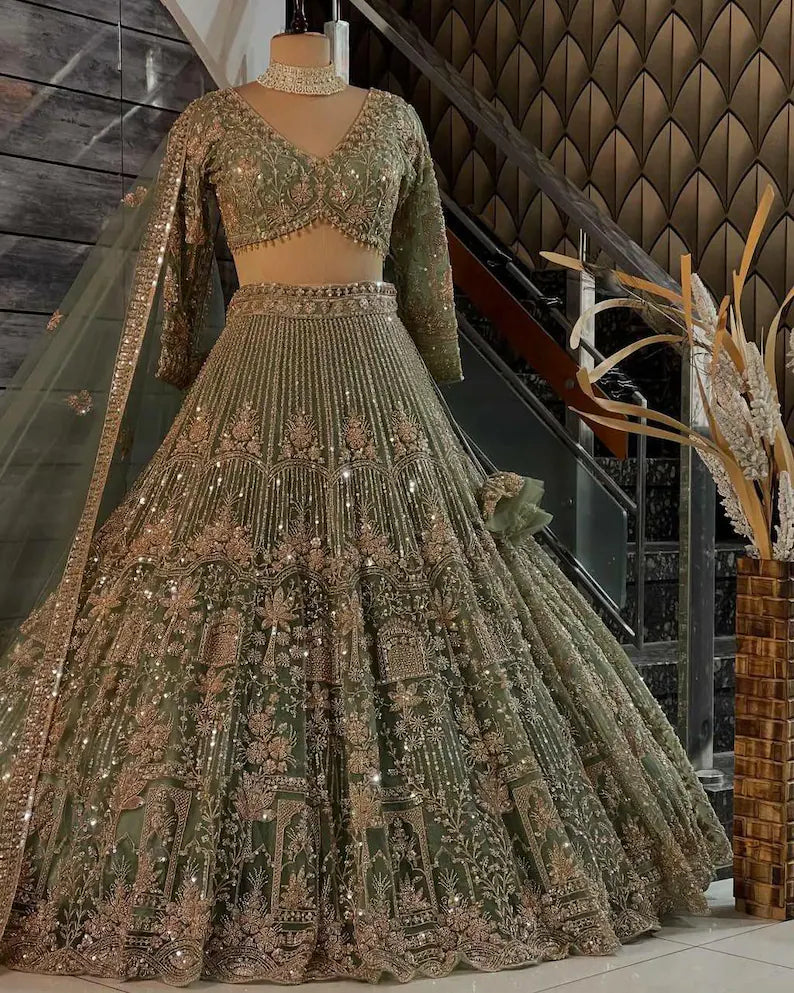 pista colour Heavy Embroidered Lehenga Set with Golden Zari and Sequin Work
