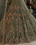 pista colour Heavy Embroidered Lehenga Set with Golden Zari and Sequin Work