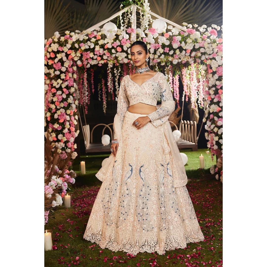 Soft Net Peacock Embroidered Lehenga Choli with Sequins & Floral Work