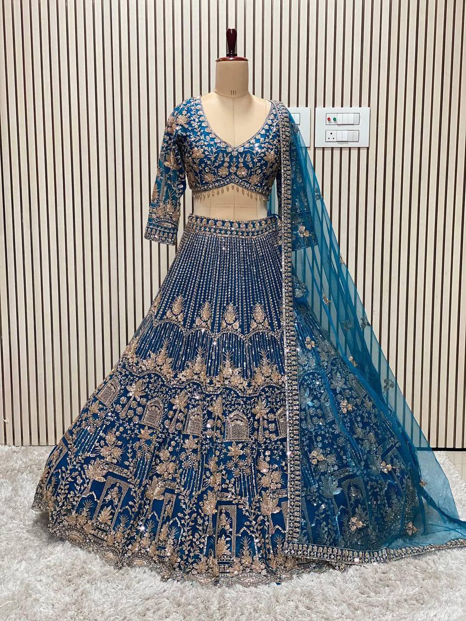 Navy Blue Heavy Embroidered Lehenga Set with Golden Zari and Sequin Work