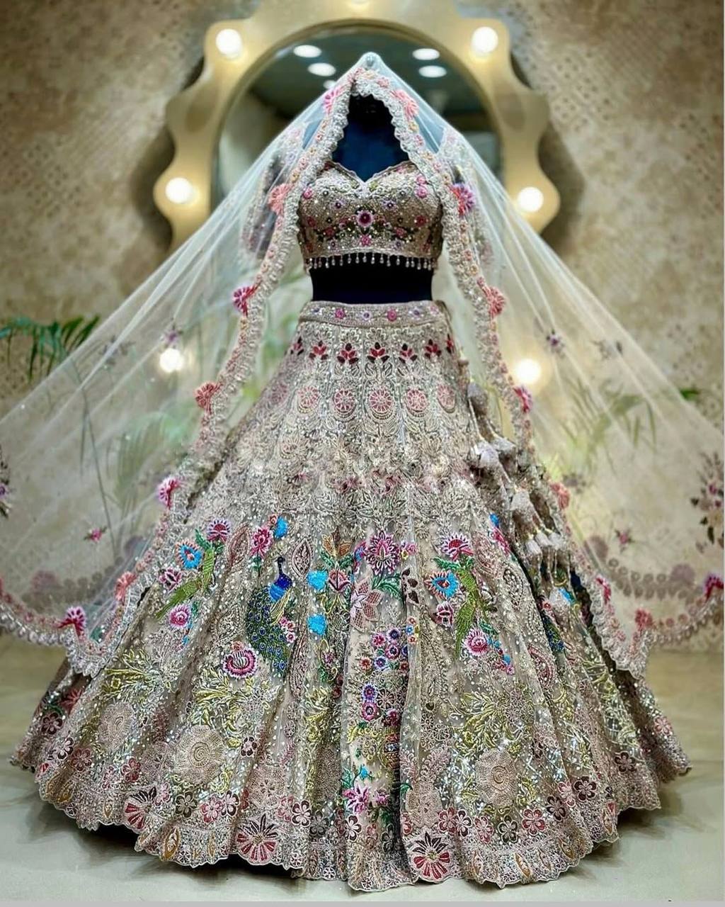 White Net Lehenga Choli with Colorful Peacock & Floral Embroidery